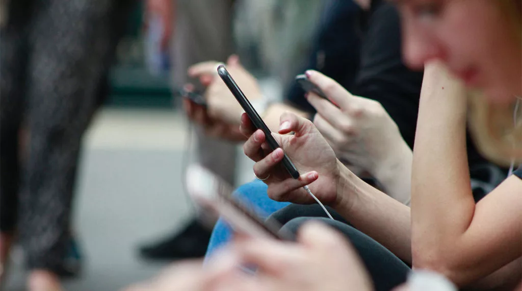 Social media affects teens by addicting them to their phones